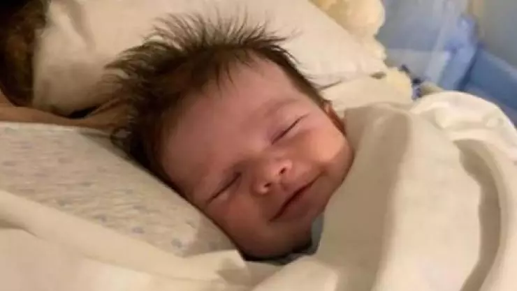 bebé sonriendo mamá muerta.jpg