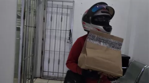 Miriam, repartidora de comida en Culiacán