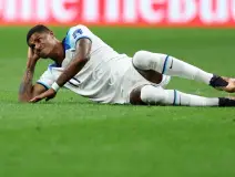 Jugador de Inglaterra en el suelo