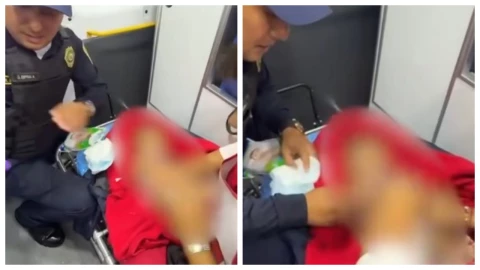 Localizan un bebé abandonado con ligera hipotermia en la Miguel Hidalgo, CDMX. En la imagen se observa como un agente capitalina, en trabajo con cuerpos de emergencia, ponsen a salvo al menor hallado en una banqueta en la colonia Tacubaya.