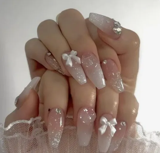 uñas con moños