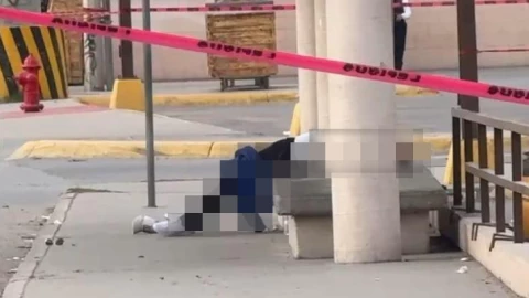 Lo ejecutan en parada de camión.