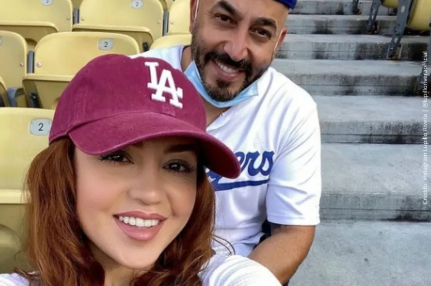 Lupillo Rivera y Giselle Soto en un juego..jpg