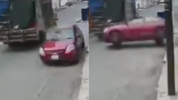 Auto es arrastrado por camión