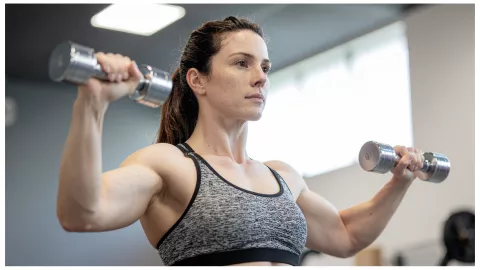 press de hombros con pesas ejercicios.png