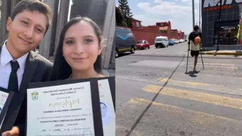 Ingenieros trabajan en el semaforo.