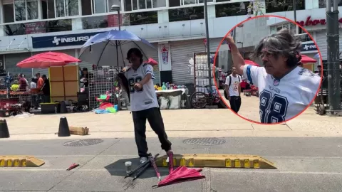 CDMX: Encapuchados roban paraguas a comerciante durante marcha por Día del Trabajo