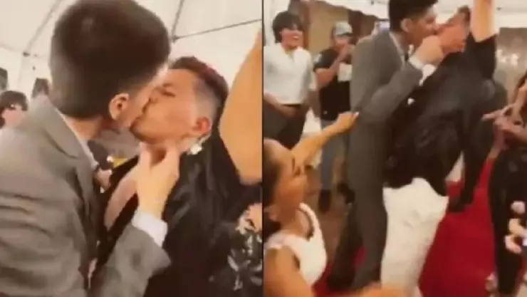 Invitado BESA A NOVIO recién casado FRENTE a su esposa en plena boda; video.jpg