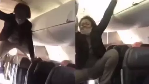 VIDEO: Mujer poseída en un avión maldice a todos