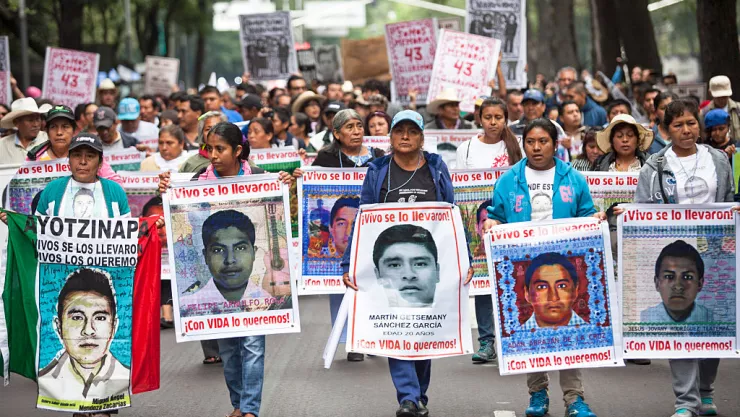 Protest In Mexico City Marks One Year Anniversary Of Missing Students