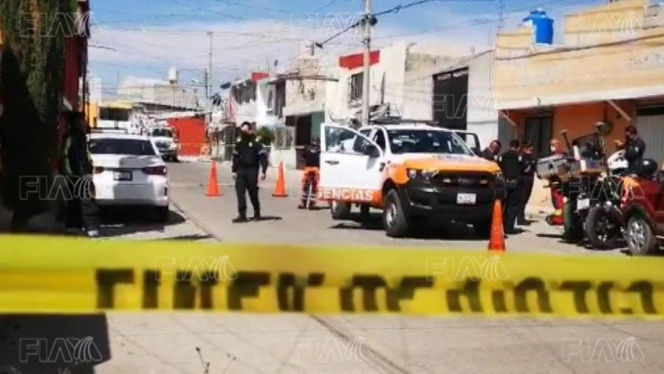 cuerpo en cisterna en casa de Puebla