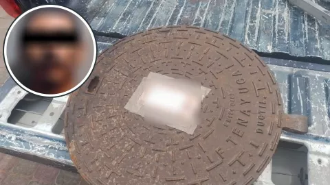 Édgar roba una tapa de alcantarillado en Culiacán