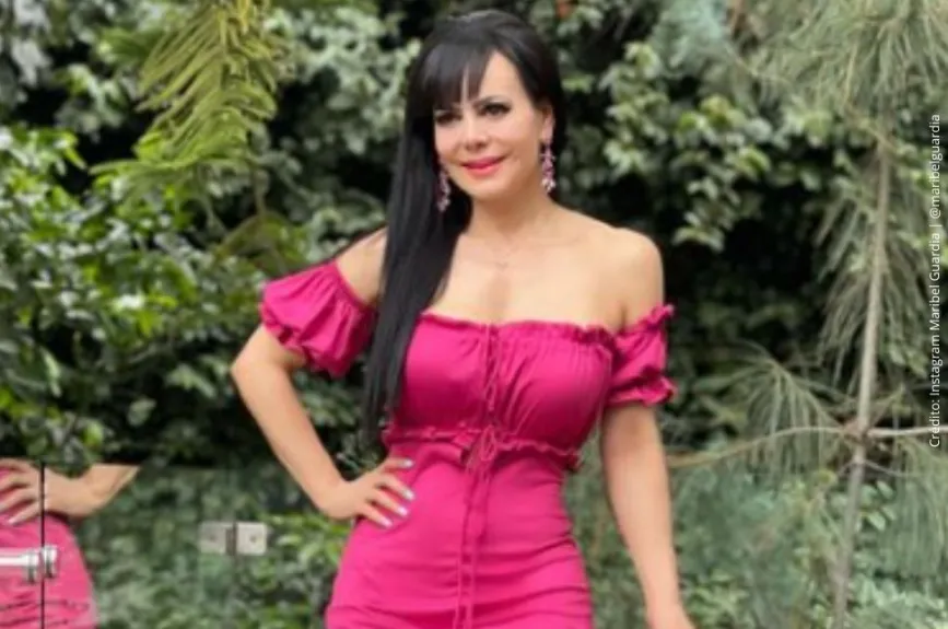 Maribel Guardia de rosa mexicano..jpg