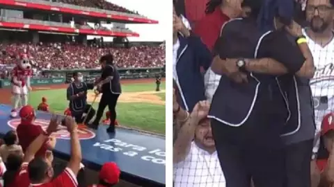 Video Pareja de limpiadores se comprometen durante juego de beisbol
