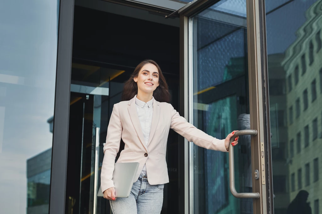 Confident young businesswoman talking on mobile