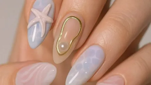 diseños de uñas con estrella de mar aesthetic