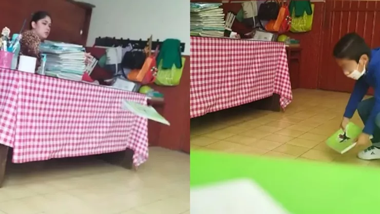 Maestra de primaria lanza cuaderno al suelo