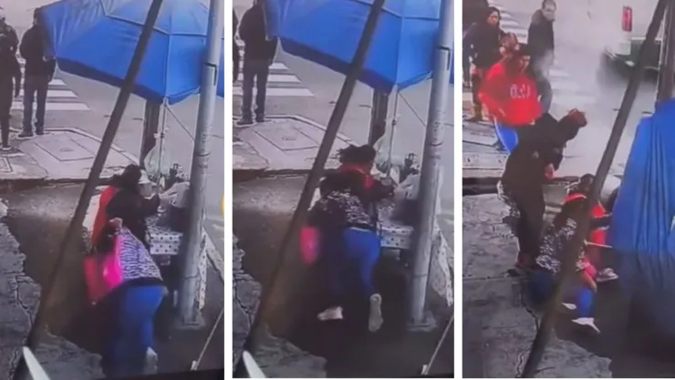 mujer tropieza y cae sobre puesto de tamales con todo y vendedora .jpg