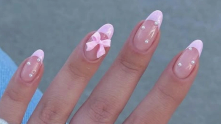 diseños de uñas con moños que se ven coquette