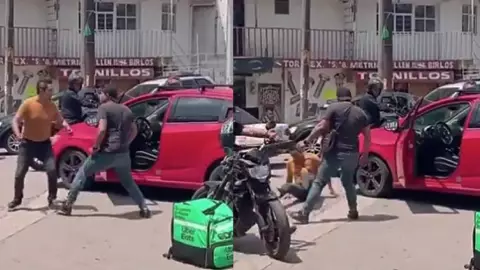 VIDEO_ ¡No sólo reparte comida! Repartidor de Uber Eats noquea a conductor en plena calle