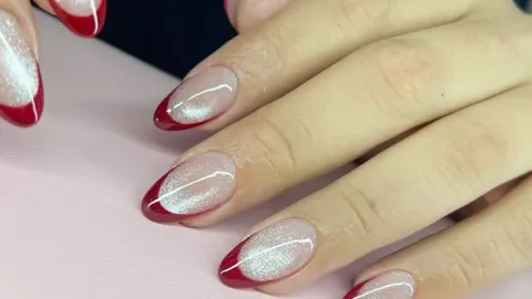 Uñas con efecto ojo de gato color rojo