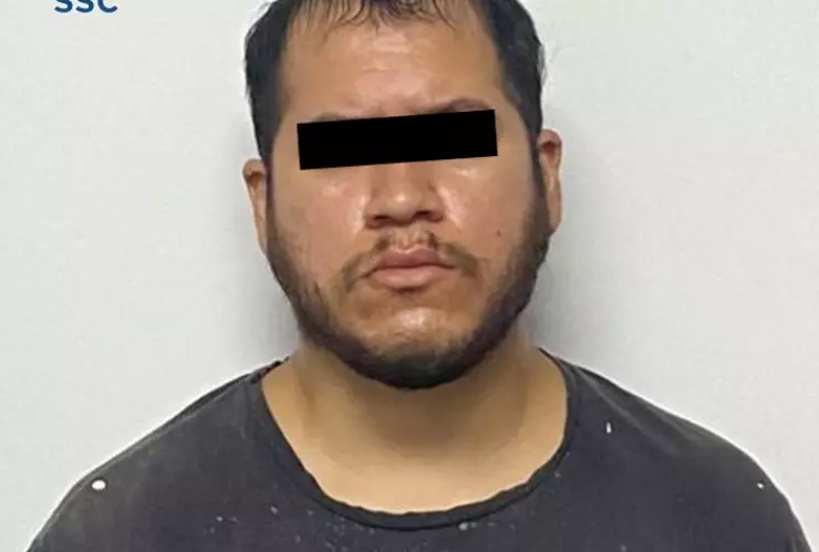 B019OA ESTADOUNIDENSE HOMICIDA DETENIDO AICM.jpeg