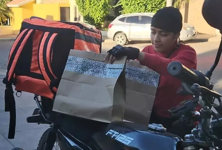 Miriam, repartidora de comida en Culiacán