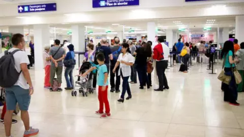 rumanos-aeropuerto-cancun.jpg
