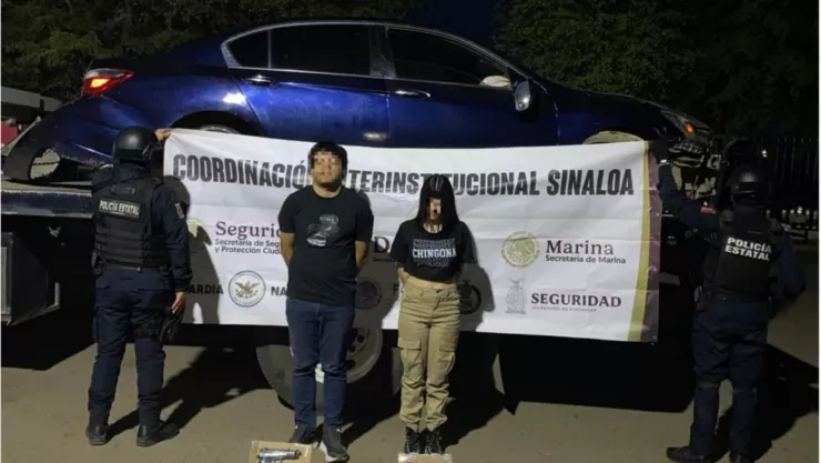Detienen a mujer y hombre armados en Culiacán.jpg