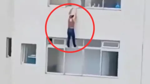 mujer quedó colgada del piso 16 de un edificio.jpg