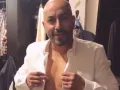 Lupillo Rivera vistiéndose..jpg