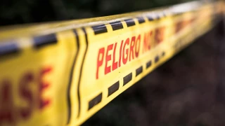 Cinta amarilla de escena del crimen.