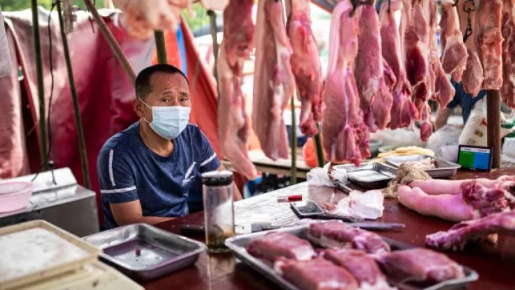 vendor-sells-pork-at-an-open-market-on-may-31-2021-in-wuhan-china-a-picture-id1320897022