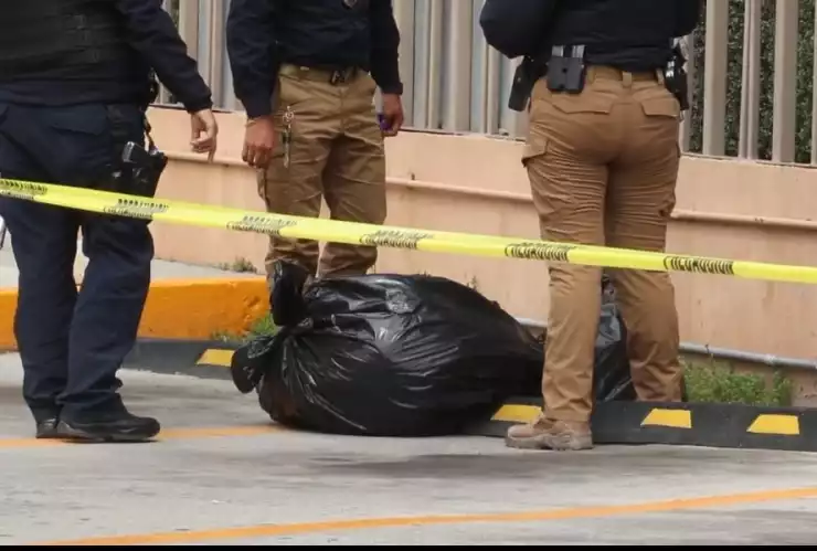 Hallazgo de bolsas con restos humanos en plaza del bulevar Agua Caliente