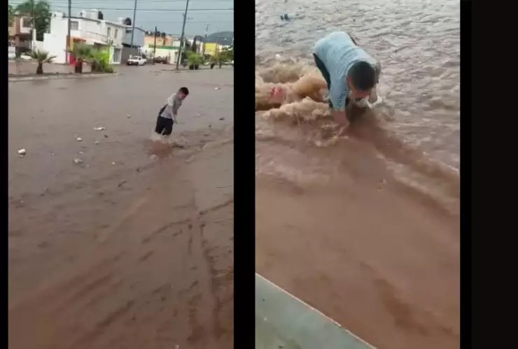 Chanclas de niño en la corriente de agua