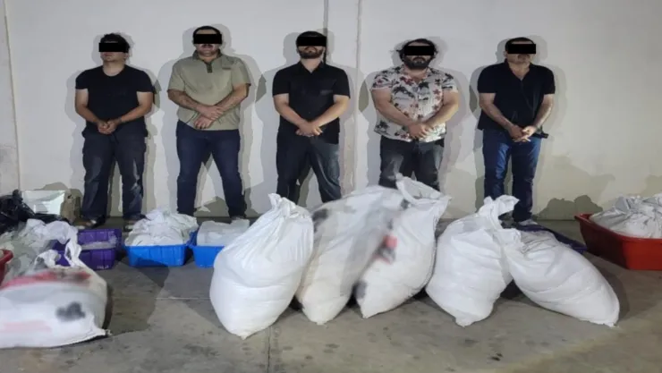 Hombres detenidos en Guamúchil