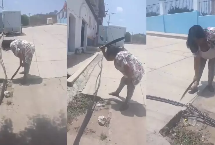 ¡Con machete en mano! Vecina corta mangueras y deja sin agua a comunidad en Oaxaca_ VIDEO.jpg