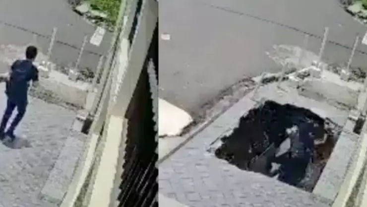 VIDEO: Se abre socavón y se ‘traga’ a joven que pasada por el lugar