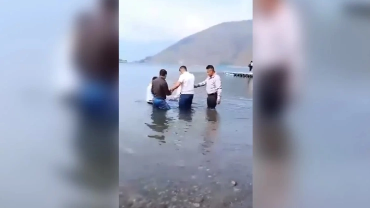 HOMBRE MUERE AHOGADO BAUTIZO LAGO GUATEMALA