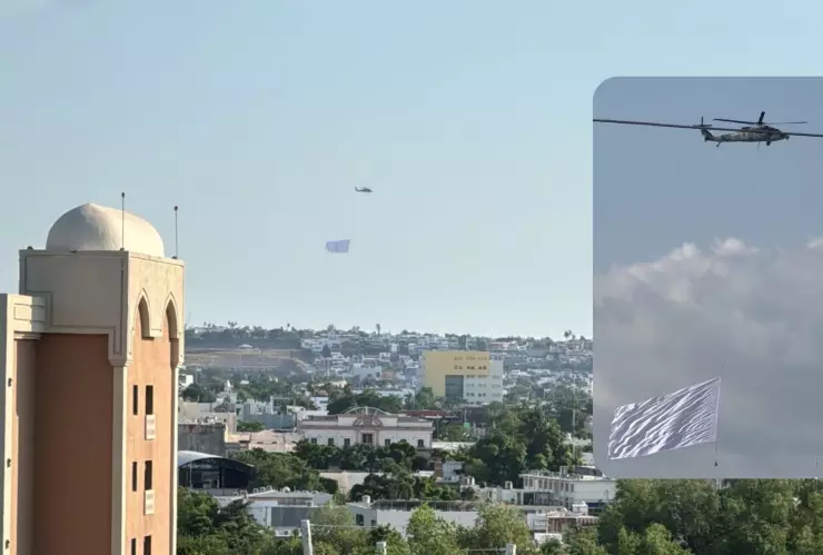 Helicóptero sobrevuela con bandera blanca en Culiacán