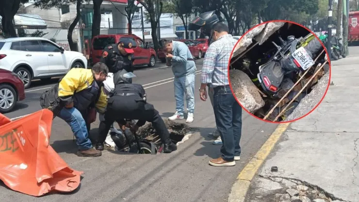 VIDEO: Motociclista cae en registro sin tapa sobre División del Norte; en la CDMX