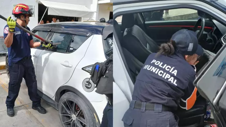 Elementos de Bomberos y de la Secretaría de Seguridad rescatan a menor atrapada en automóvil Playa del Carmen.jpg