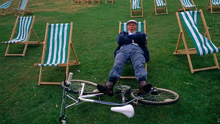 England - London - Sunbather enjoying snooze in Hyde Park