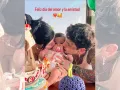 Cazzu y Christian Nodal besando a Inti.jpg