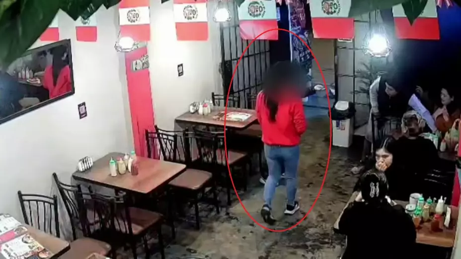 Imagen de cámara de vigilancia durante atraco en Perú.