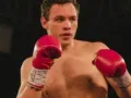 Julio Cesar Chavez Jr. con guantes rojos..jpg