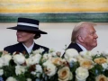 Fotos y momentos destacados de Donald Trump y Melania durante la toma de protesta presidencial.