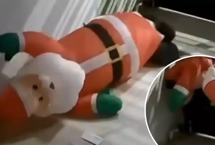 sujeto se roba inflable de Santa Claus.png