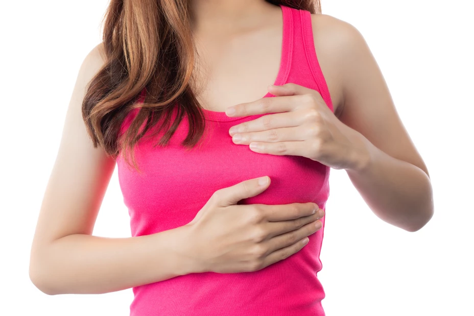 Beautiful woman, breast examination by herself (BSE) Breast Cancer Awareness (BSE).