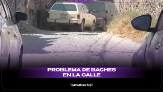baches en calle Héroes de Nacozari